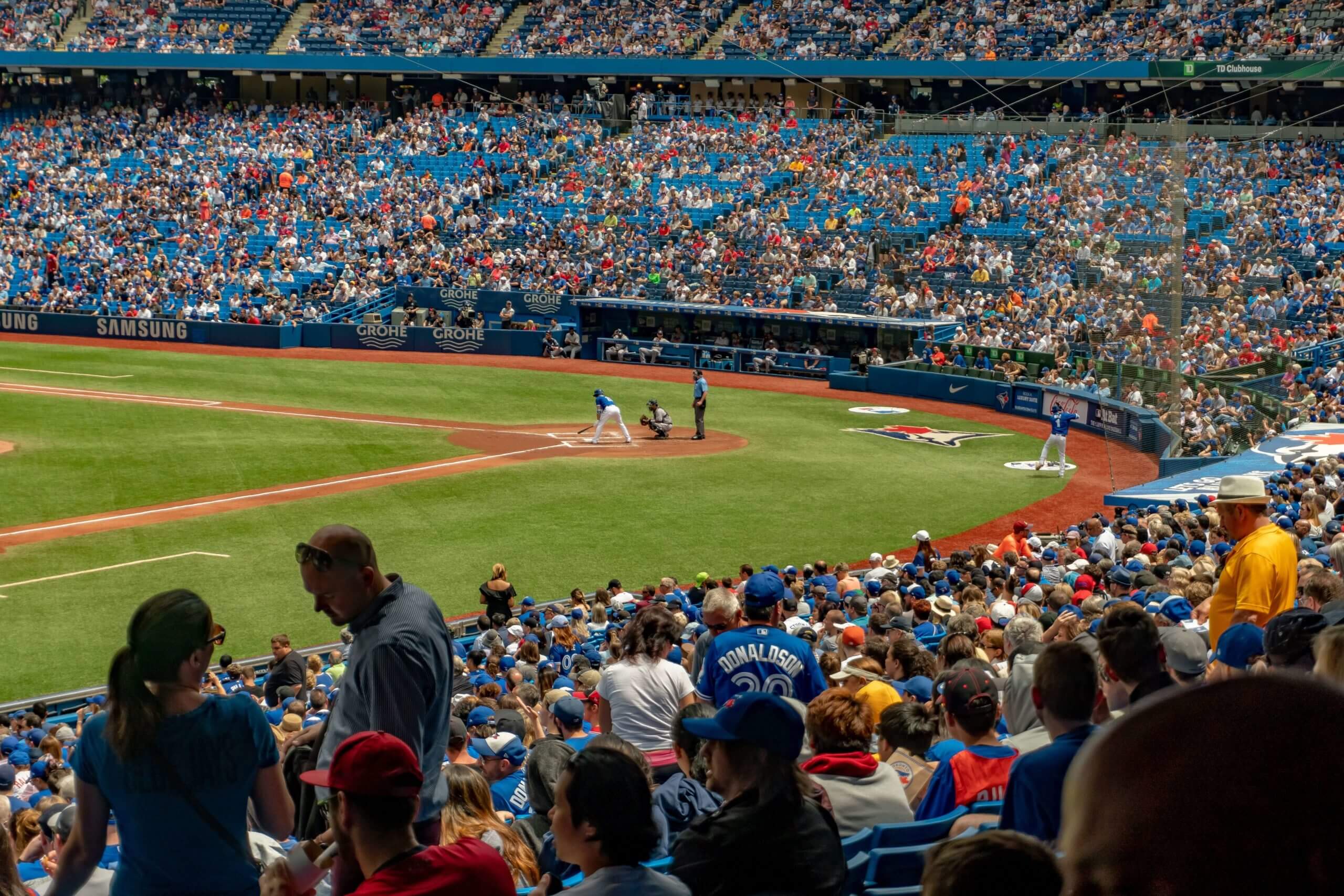 Image of the Toronto Blue Jays playing baseball at the Rogers Centre with a large crowd