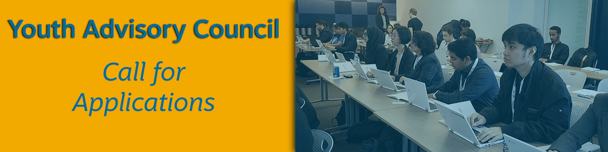 Image of a group of tech students with laptops at a long table in a classroom next to an orange rectangle with Youth Advisory Council Call for Applications in blue text font